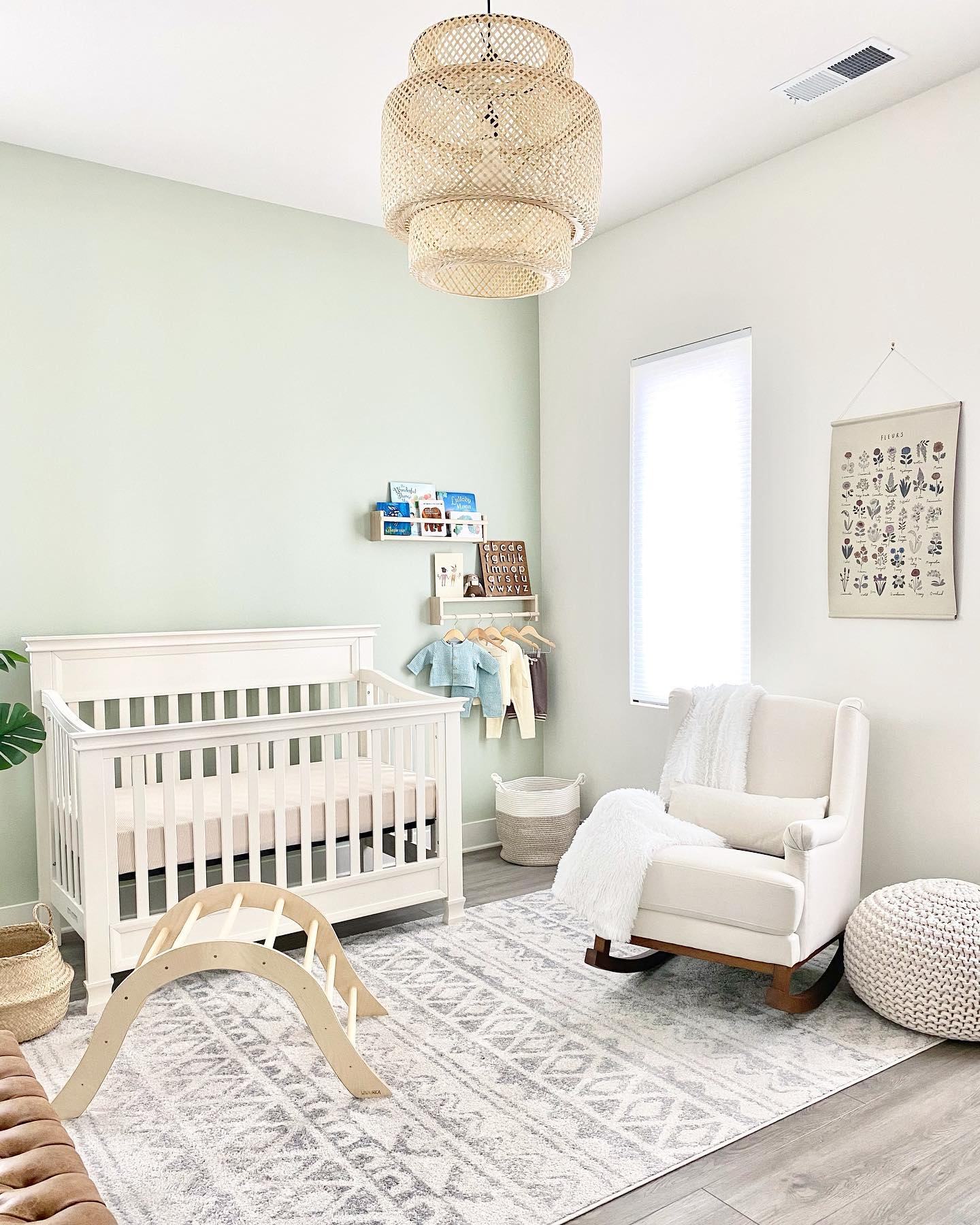 21. Soft Mossy Hues and Whimsical Woodland Creatures In a Cribside Haven