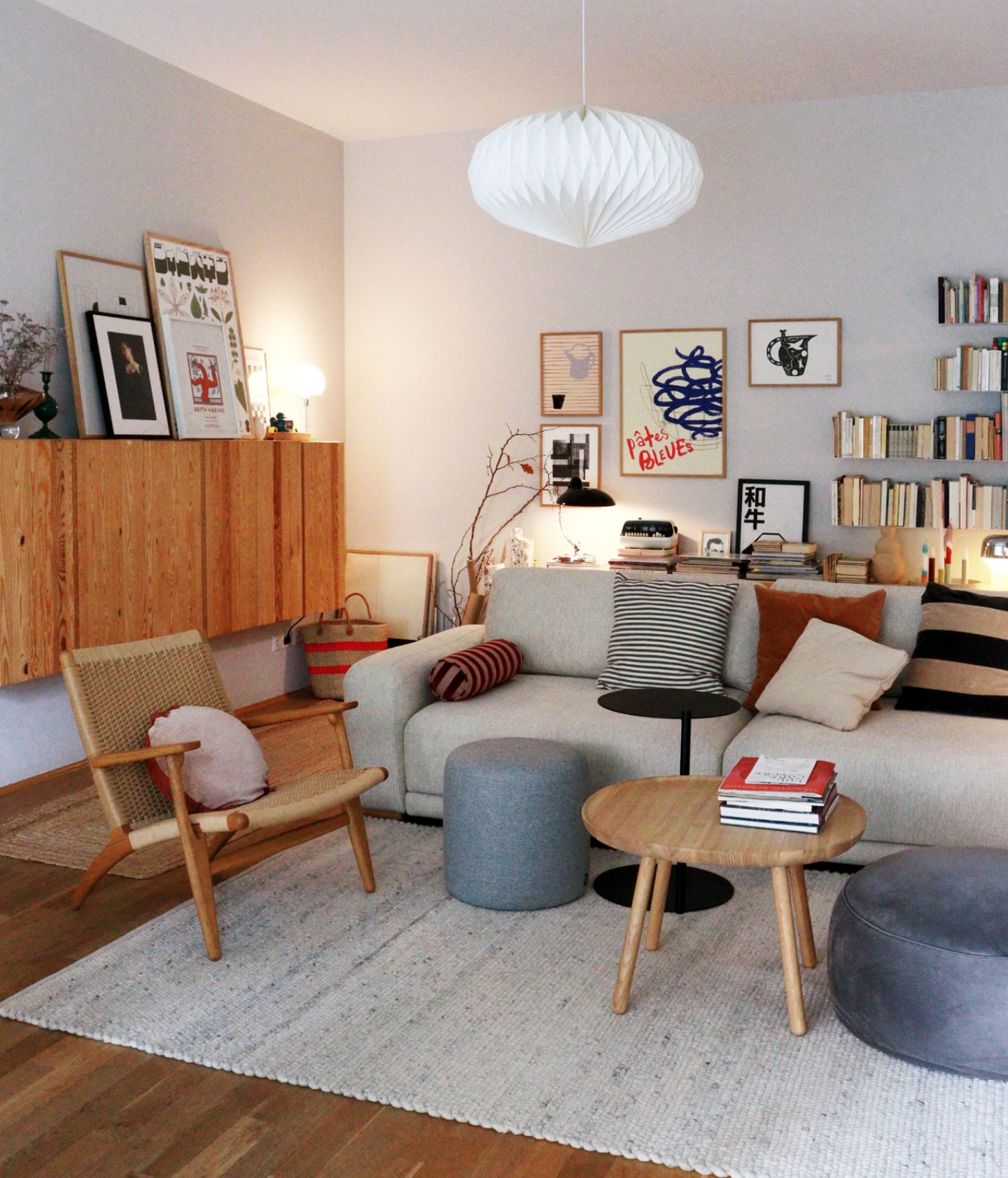 35. the Velvet Armchair with the Geometric Throw Pillow and the Brass Floor Lamp