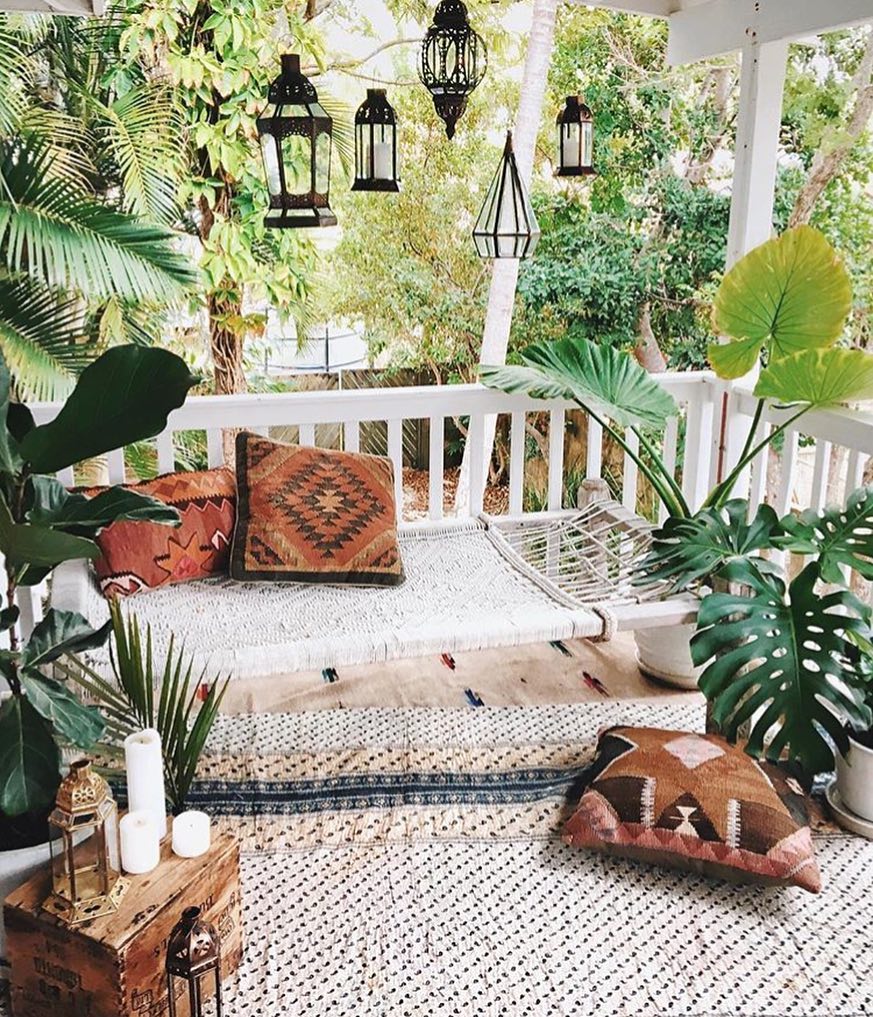6. the Moonlit Oasis: a Patio with a Stone Fire Pit and Woven Rattan Seating