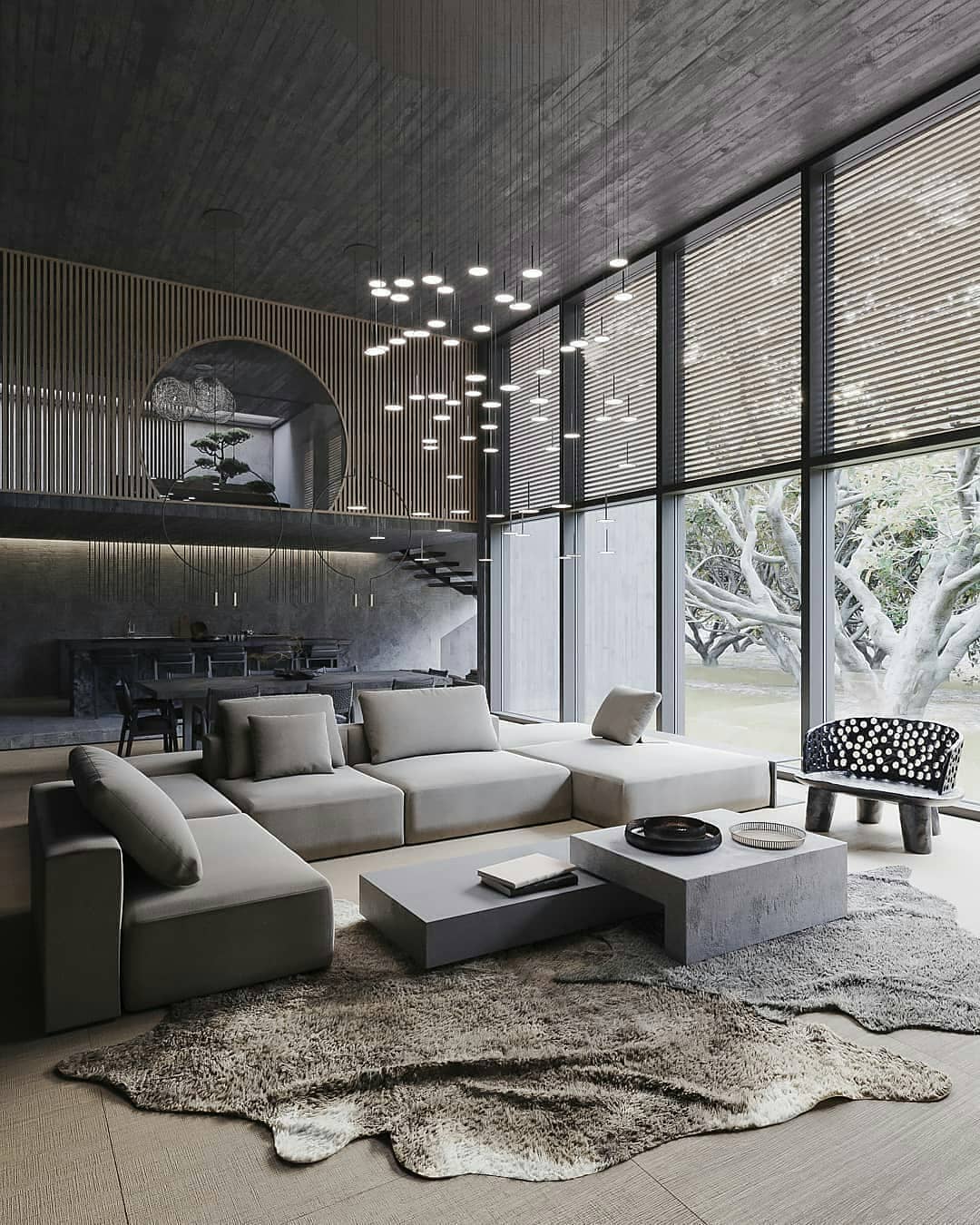 16. a Sunken Conversation Pit with Geometric Fireplace and Monochrome Art