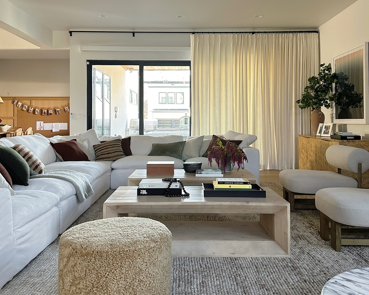 11. Velvet Plum Sofa with Geometric Gold Coffee Table In Sunlit Living Room