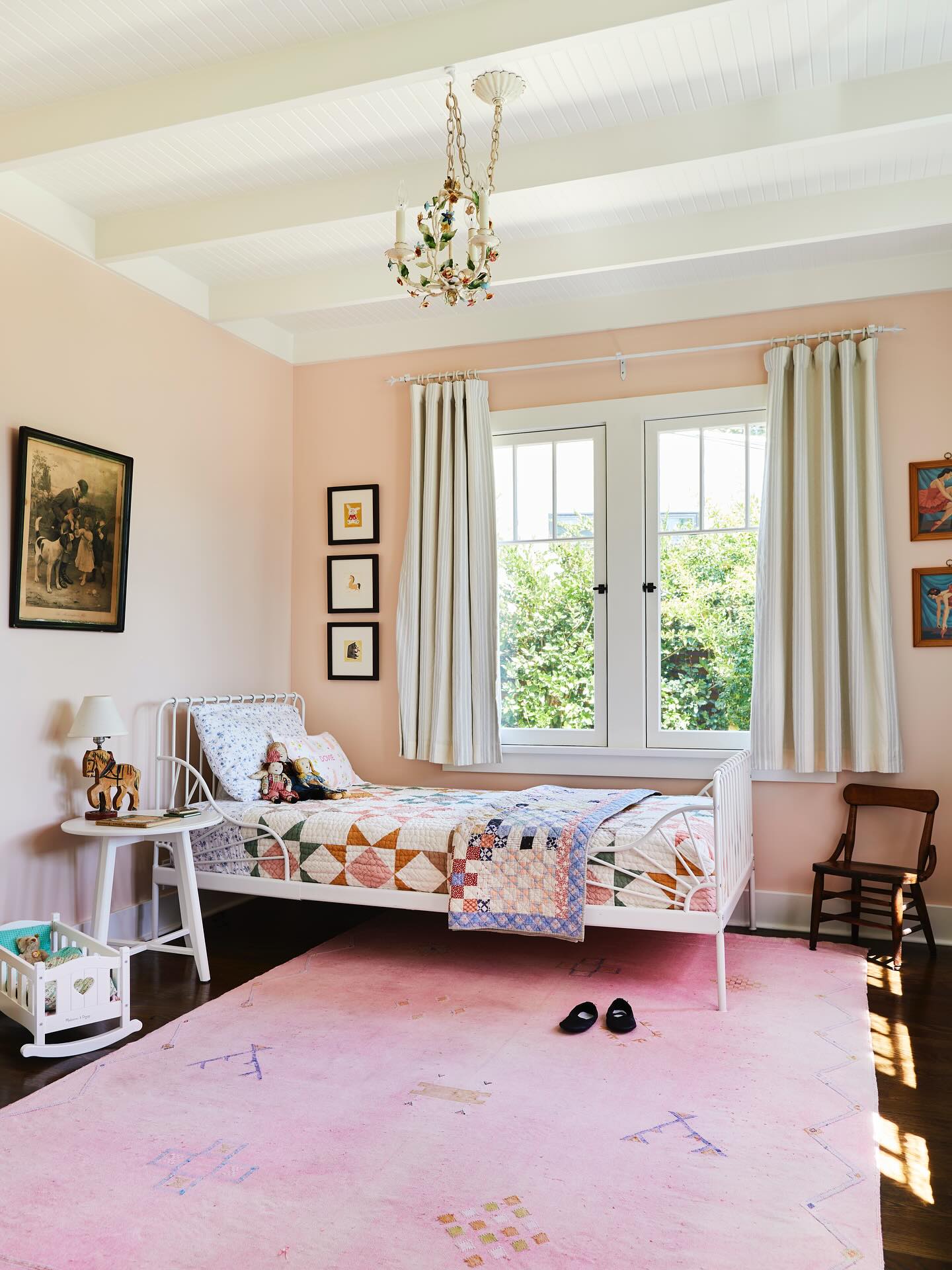 53. Dreamy Pink Canopy with Starry String Lights Over Cozy Floral Bedding