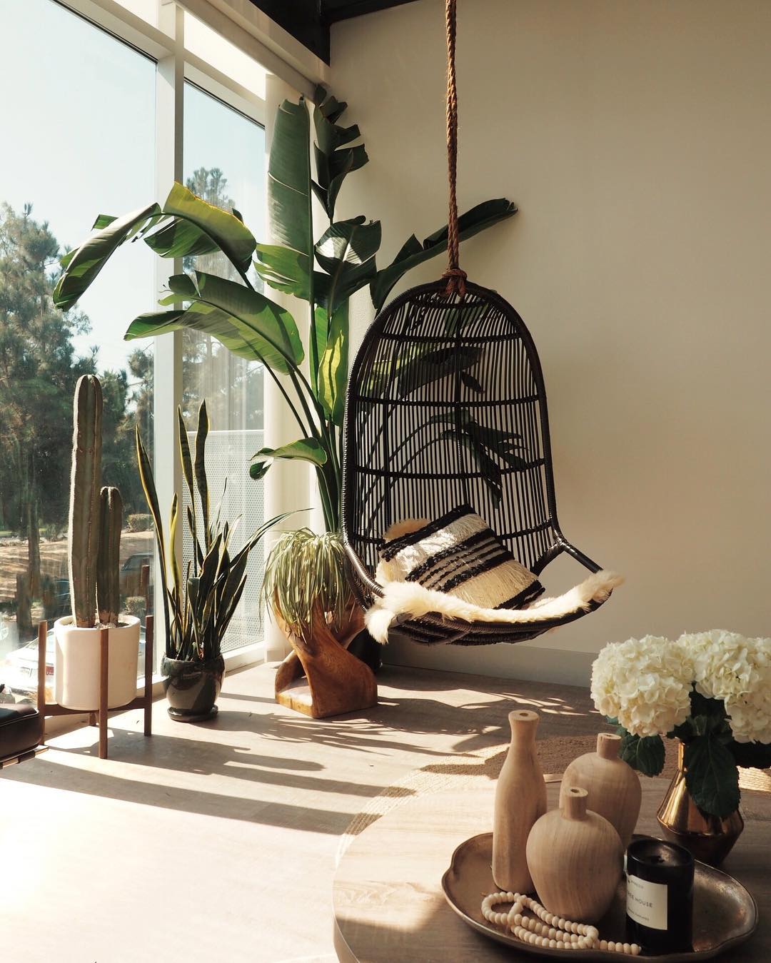 6. Bohemian Macrame Dreamcatcher Over Rattan Mirror In Sunlit Nook