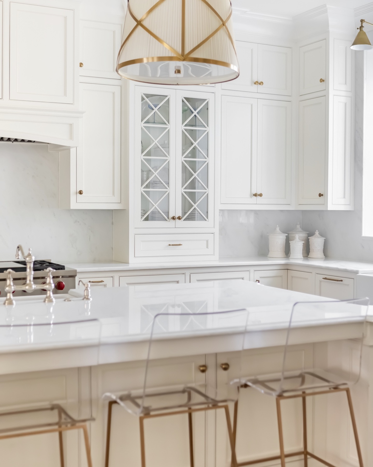 26. Frost-kissed Cabinets with Geometric Elegance: a White Kitchen Transformation