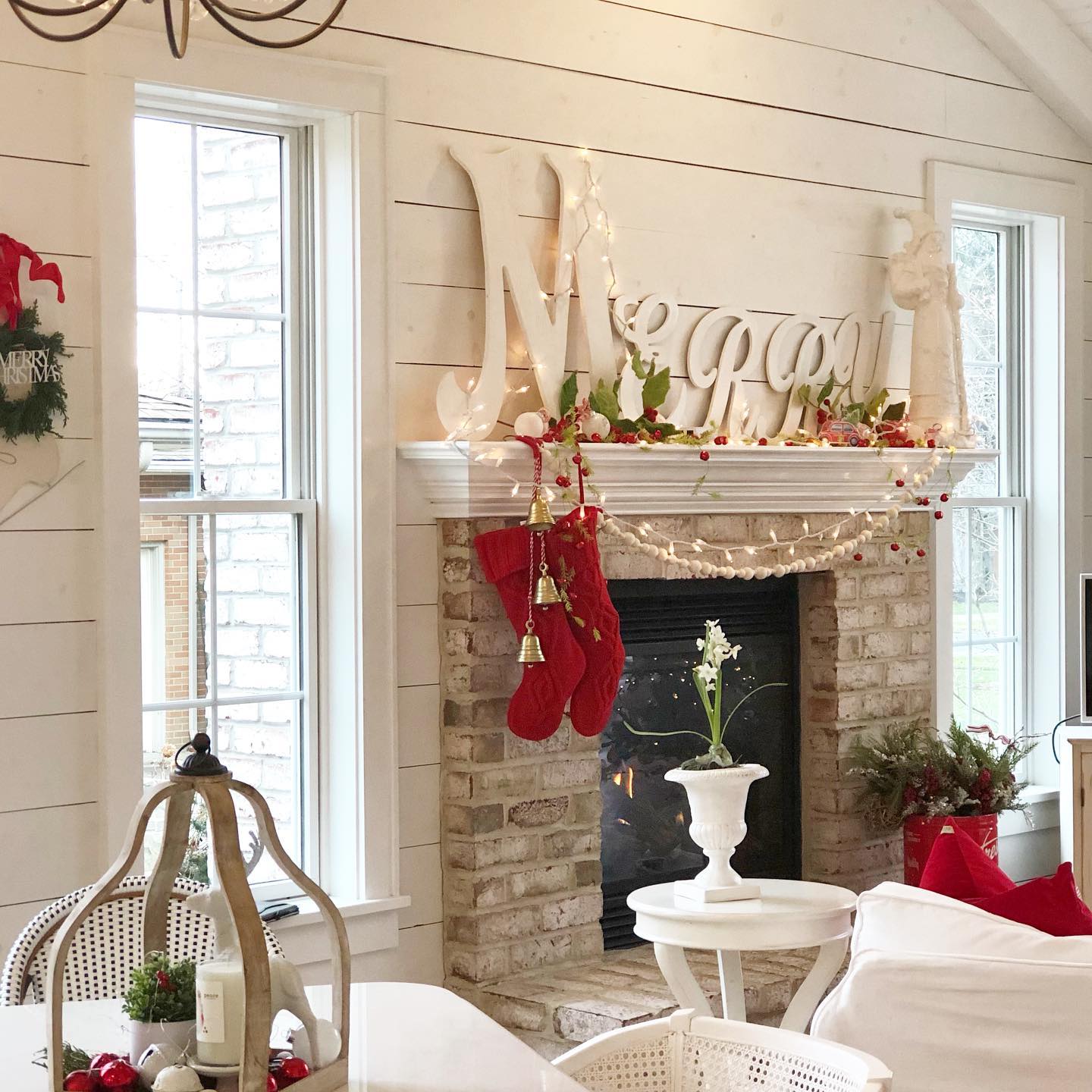 21. Crimson Ribbons and Frosted Pinecones: a Festive Mantelpiece