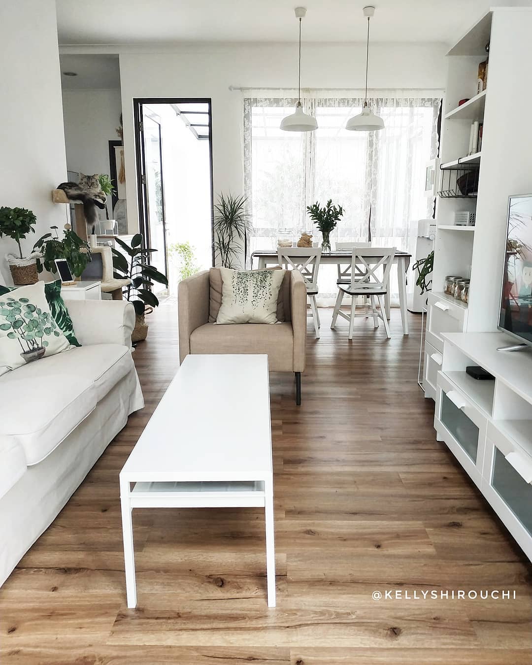 10. a Crimson Sofa Anchored by Geometric Floor Tiles In a Cozy Nook
