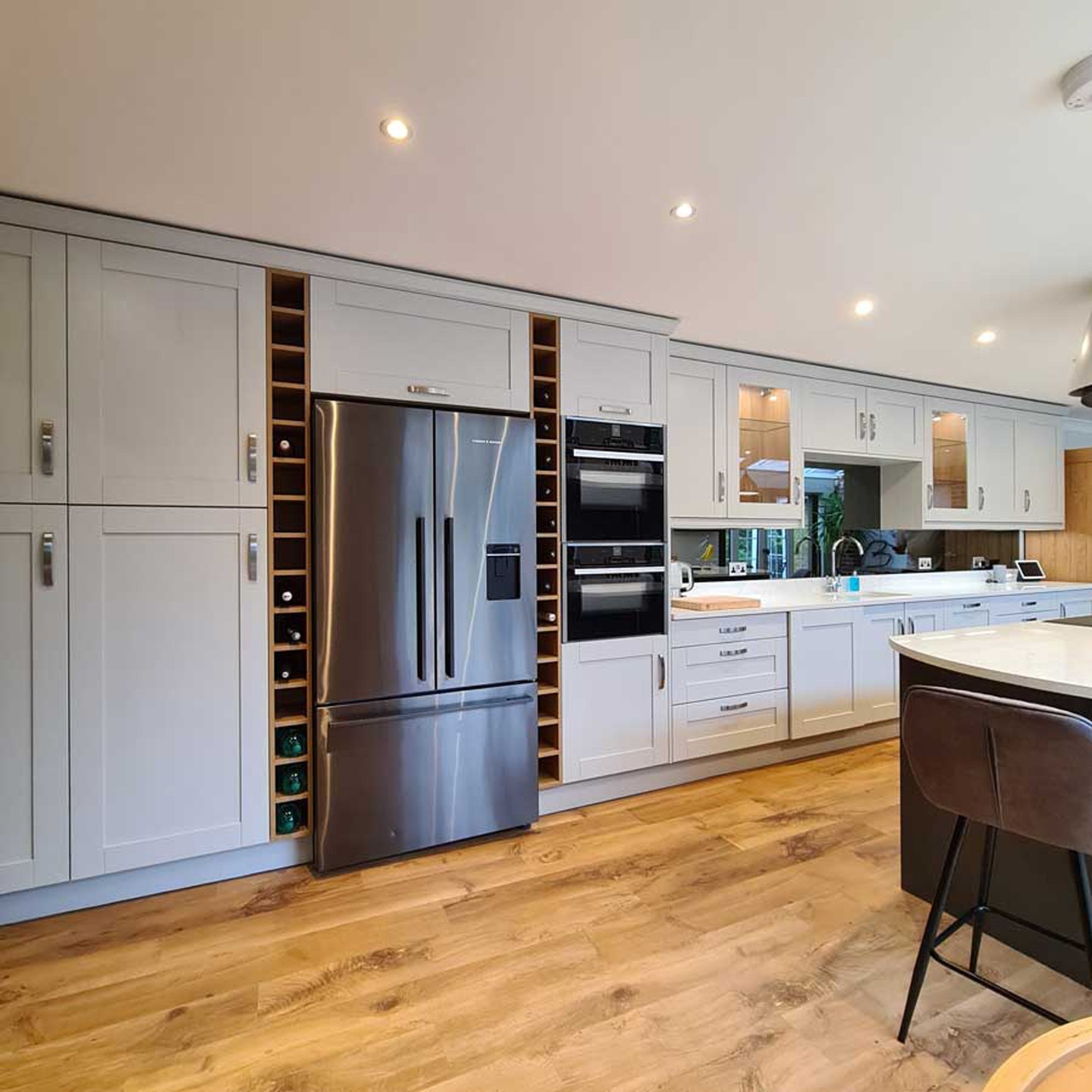 7. Goldenrod Glow: a Kitchen with Brass Accents and Open Shelving