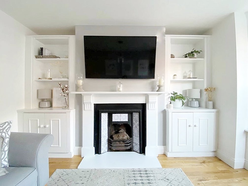 23. Zigzag Shelves and Geometric Wall Art In a Sunlit Nook