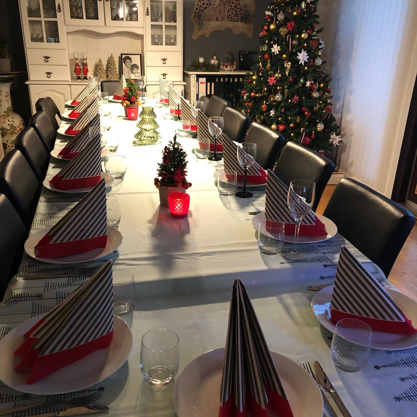 17. Crimson Ribbons and Golden Pinecones: a Festive Table Setting