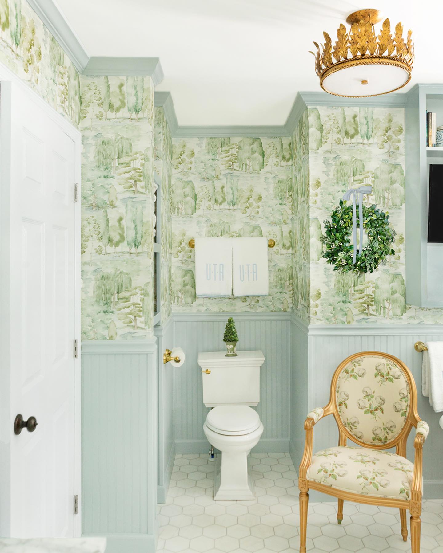 15. Frosted Pinecones and Glistening Snowflakes on a Vintage White Sink