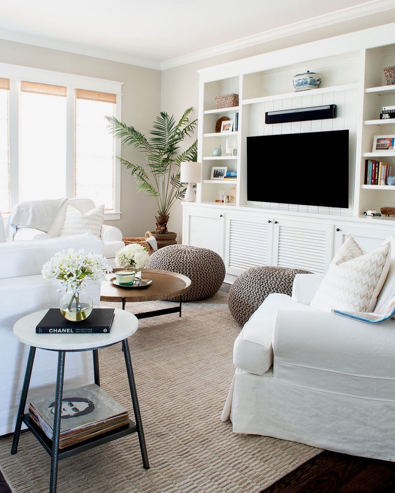 9. Cozy Nook with a Sapphire Velvet Armchair and Geometric Wall Art