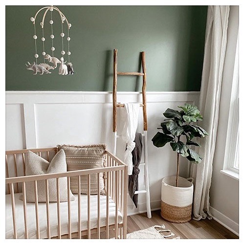19. Sage Green Crib with Whimsical Cloud Mobile and Geometric Wall Art