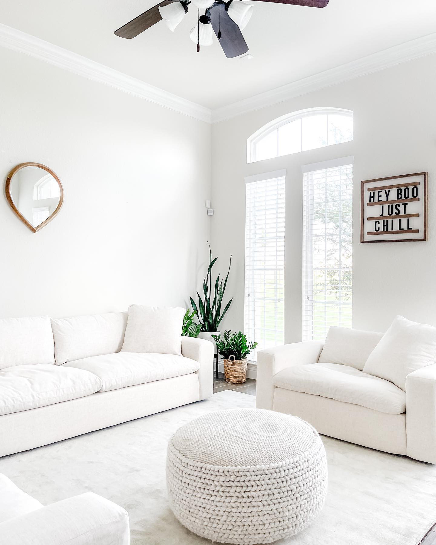 43. Velvet Slipper Chairs and Geometric Wall Art In a Taupe Haven
