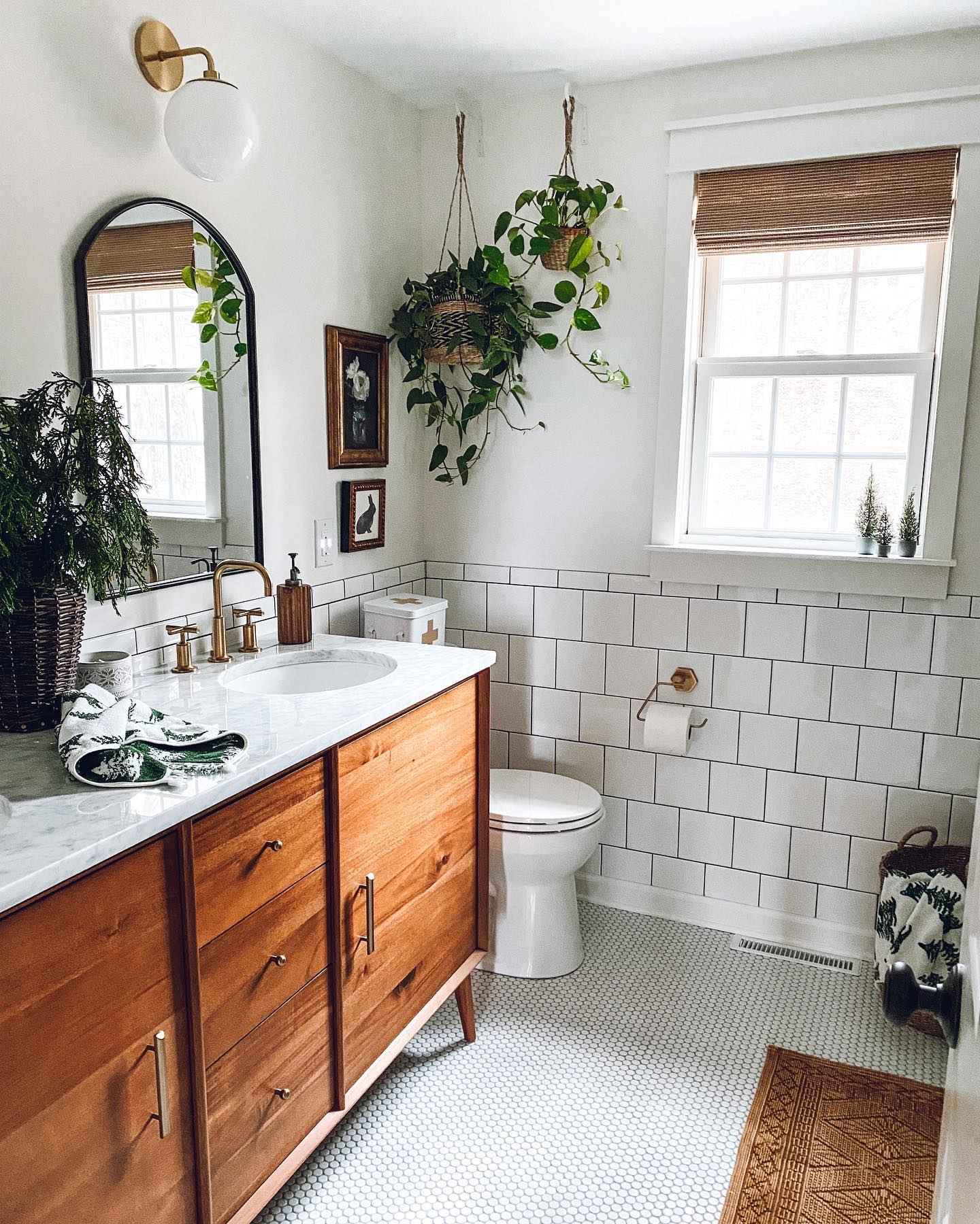 25. Frosted Pinecones and Ribboned Towels on a Vintage Sink