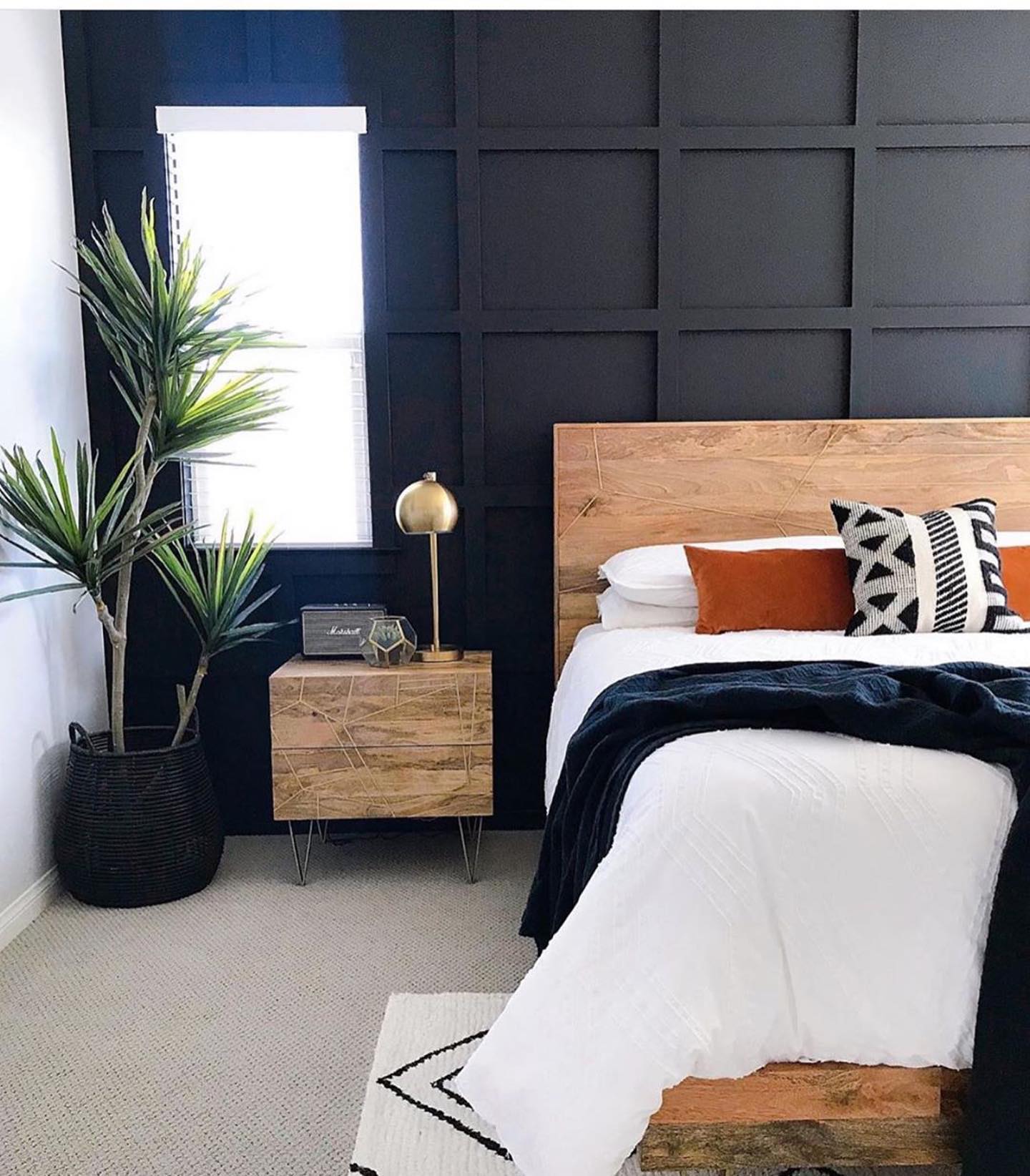 27. Bohemian Rhapsody: Macrame Canopy Over Vintage Trunk Bed