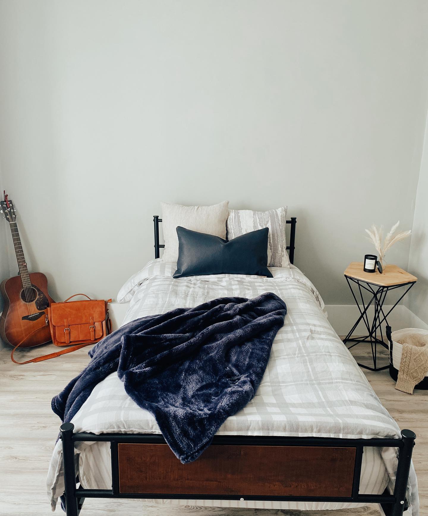27. Masculine Loft with Exposed Brick and Industrial Piping Accents
