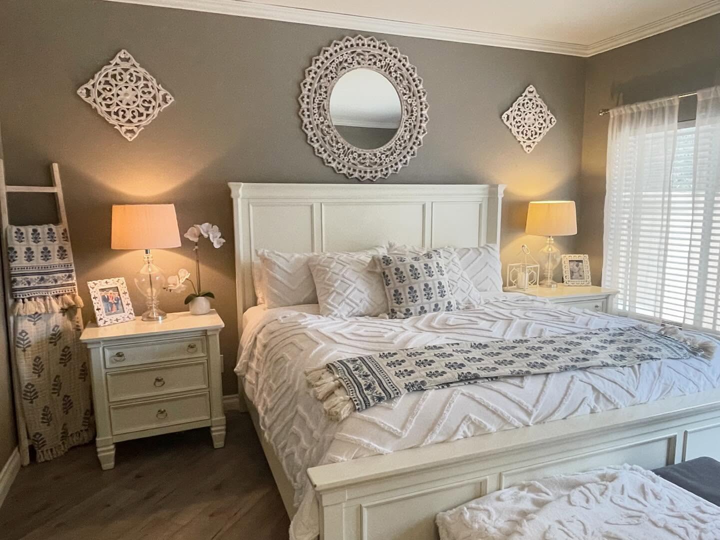 26. Handcrafted Wooden Bed with Woven Basket Accents and Rustic Lantern Glow