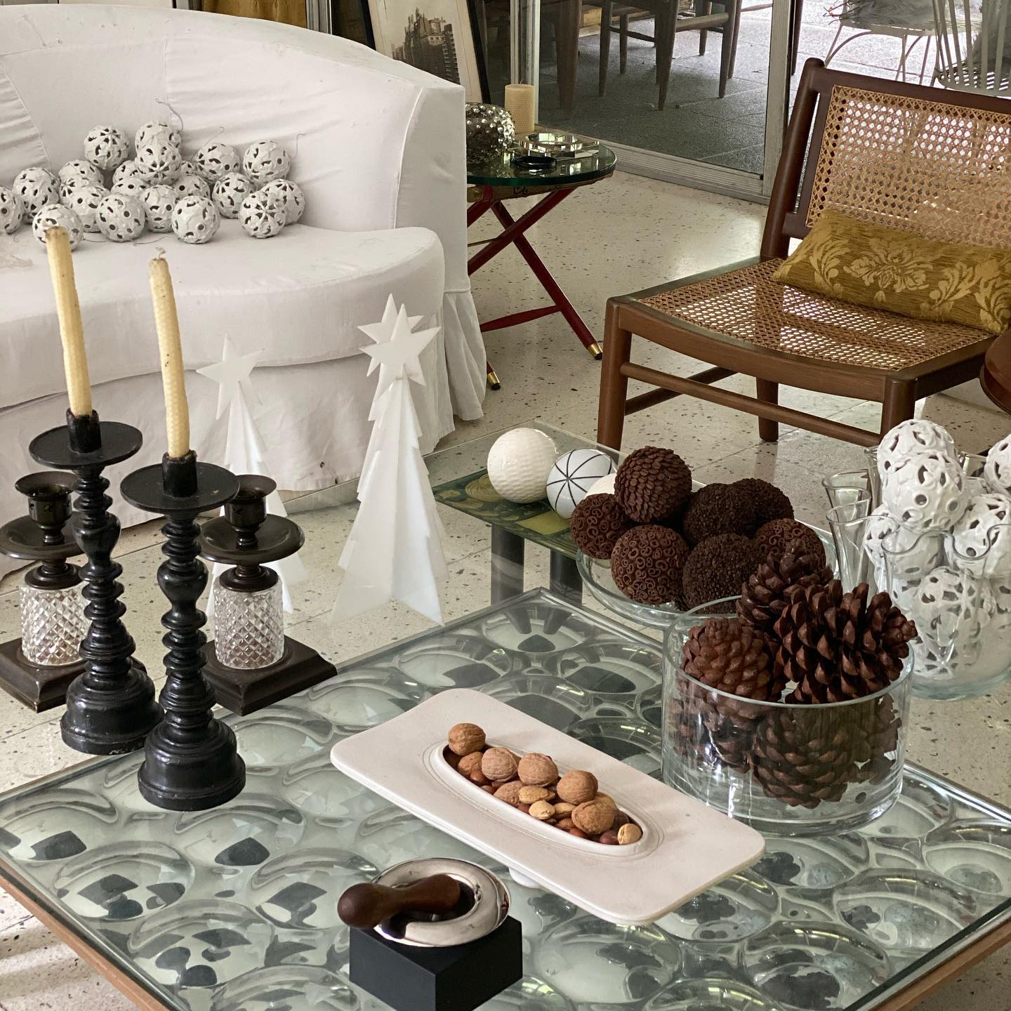 13. a Reindeer and Pine Cones Waltz on a Glass-topped Table