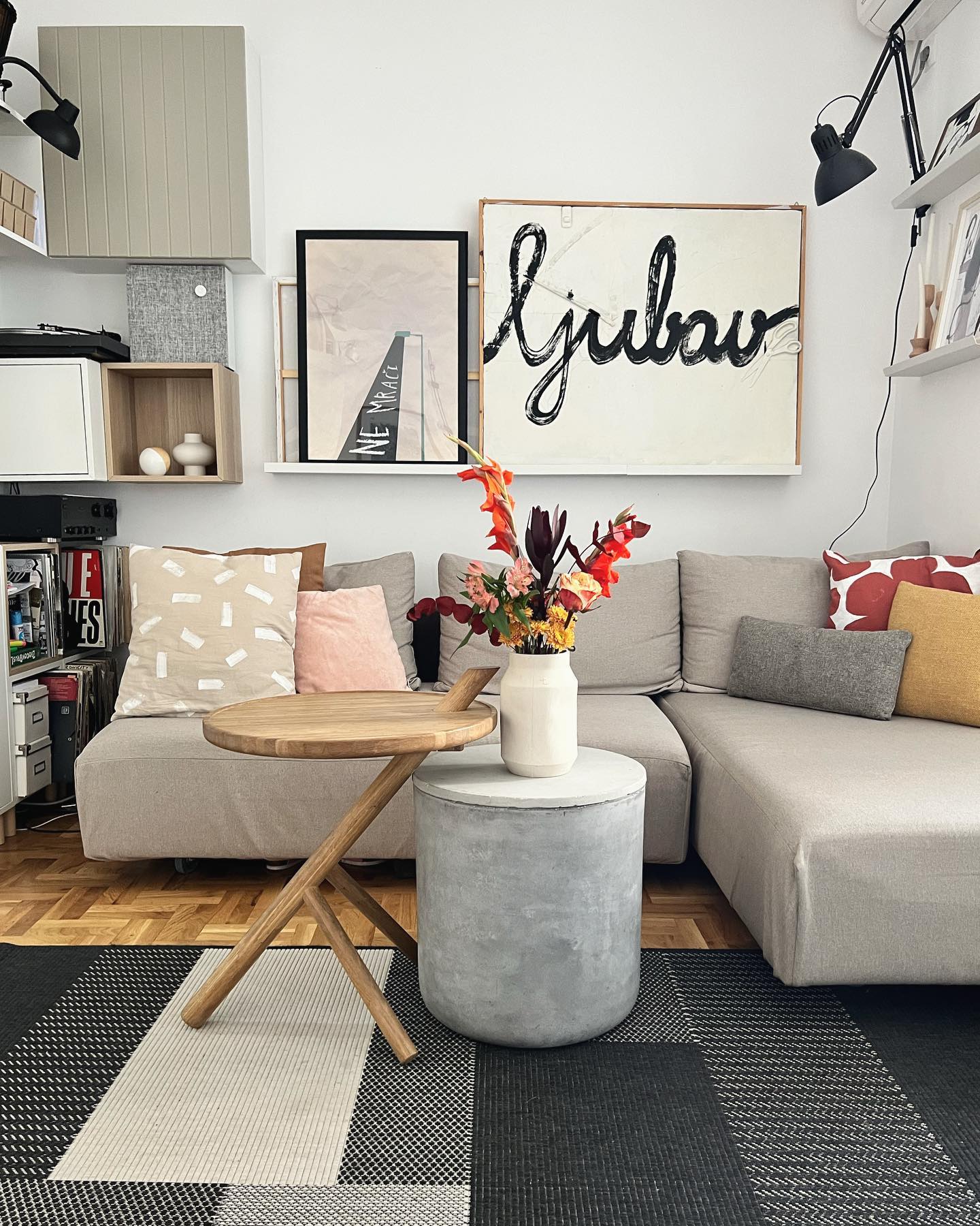 23. Whimsical Wallpaper Meets Geometric Shelving In Cozy Corner Nook