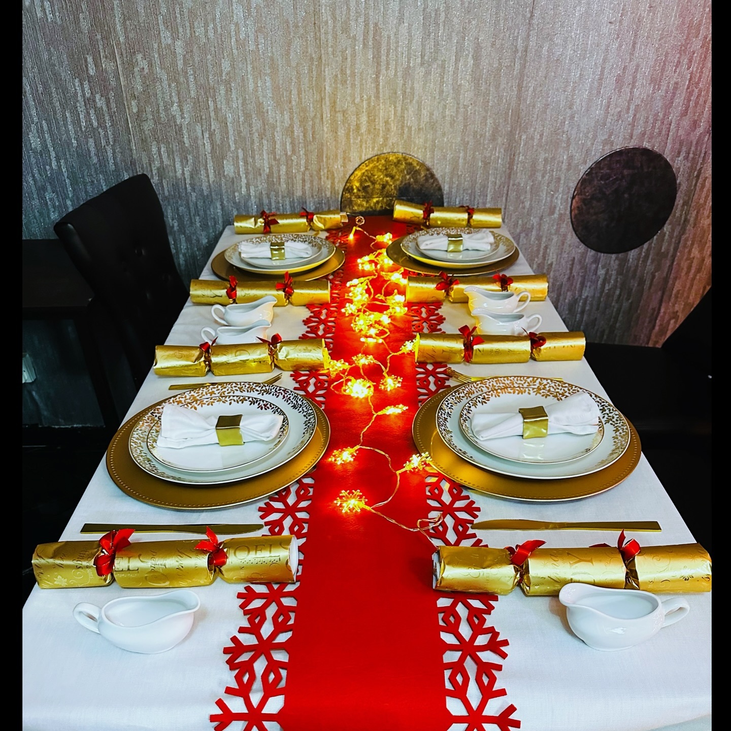 14. Crimson Ribbons and Golden Pinecones: a Festive Table Setting