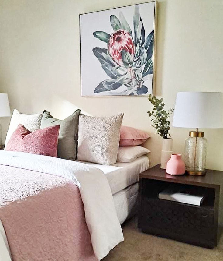 22. Moonlit Lavender Dreamscape: a Bedroom with Purple Hues and Celestial Wall Art