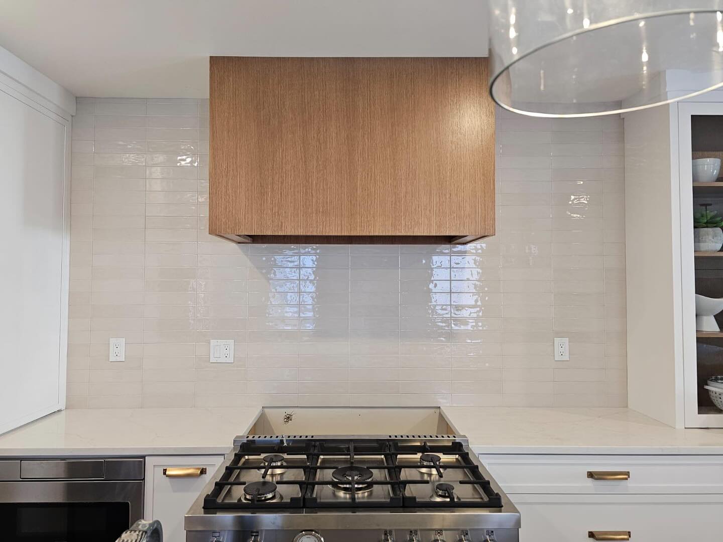 23. the Cerulean Wave: a Backsplash Of Blue Glass and White Subway Tiles