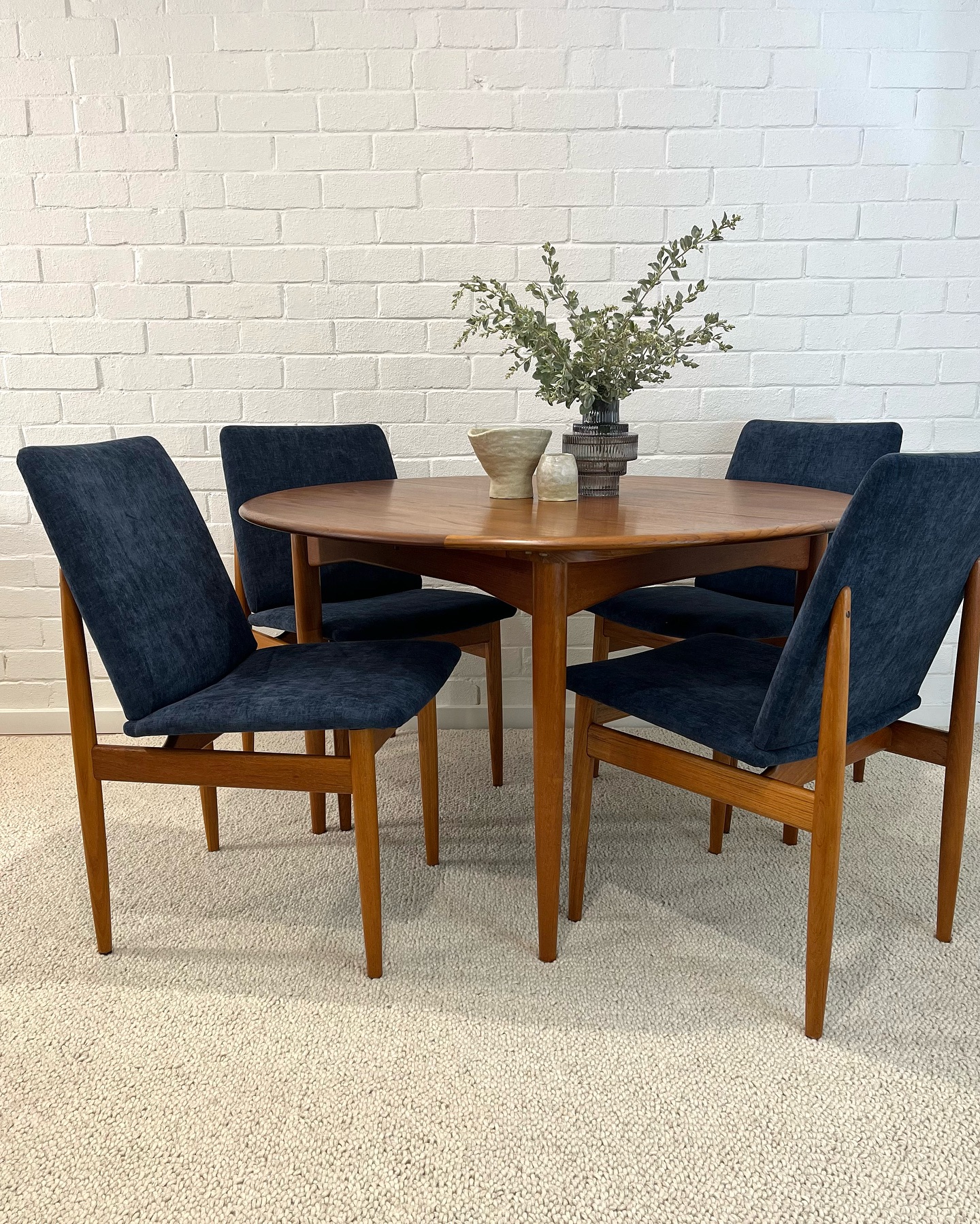 10. Mid-century Modern Dining Table with a Zigzag Base and Amber Glow Top