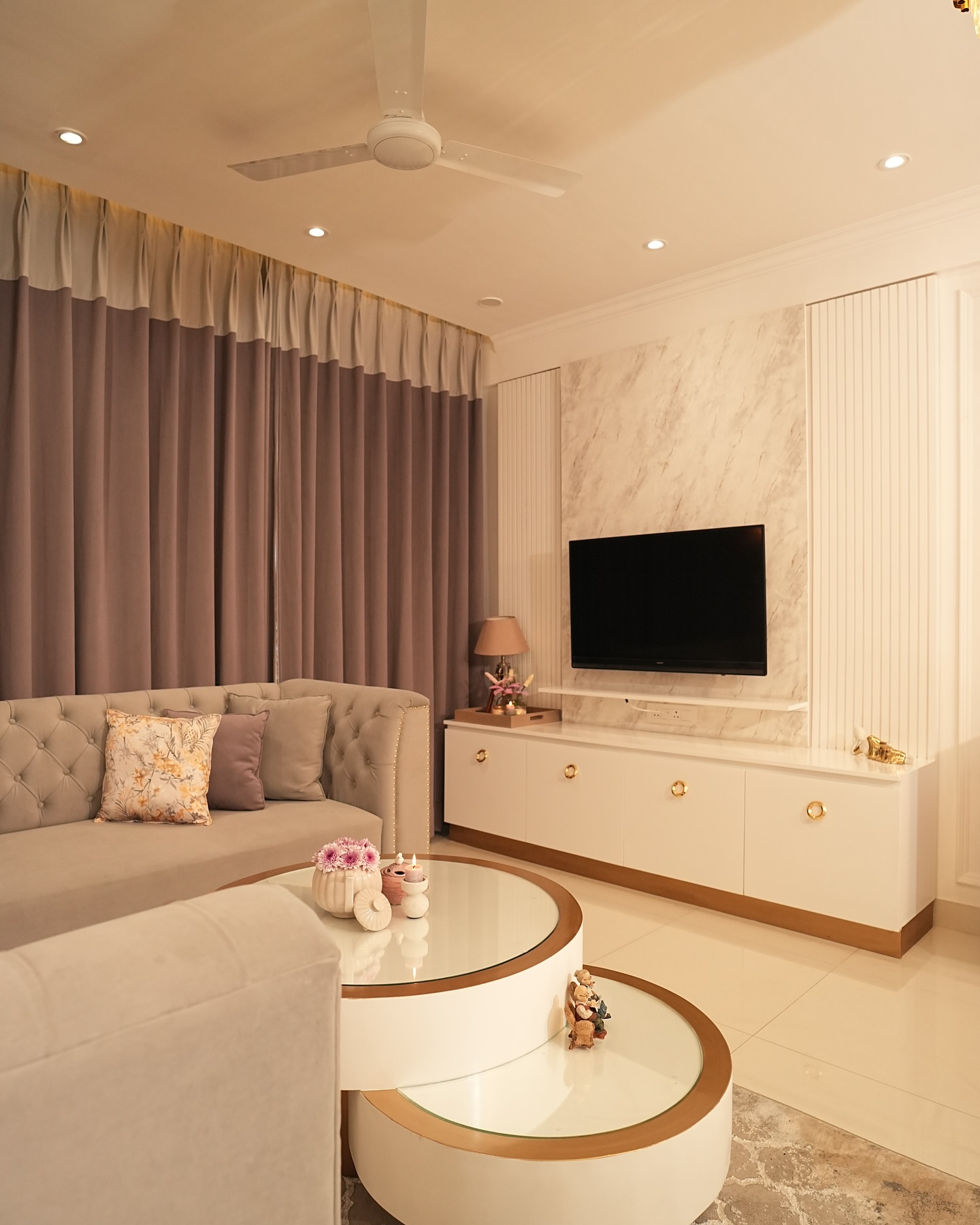 31. the Indigo Velvet Sofa with Geometric Brass Coffee Table In a Sunlit Nook