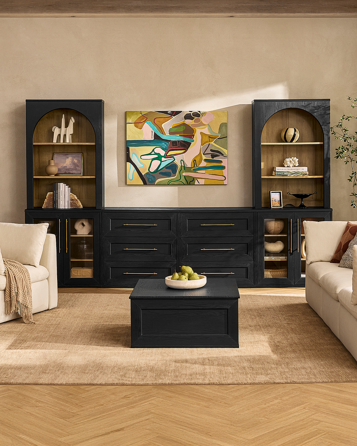 10. the Azure Velvet Sofa with Geometric Gold Accents and a Cactus Companion