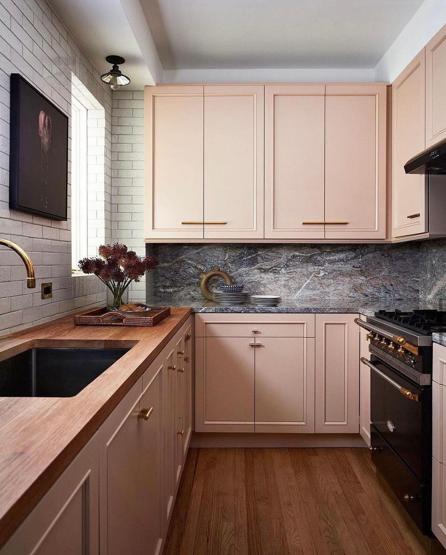 15. Fuchsia Whimsy with Retro Radiance: a Pink Kitchen with Polka-dot Backsplash