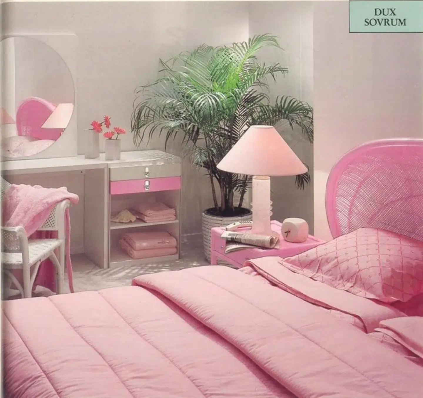 33. the Rose Quartz Canopy Bed with Lavender Accents and Polka Dot Pillows