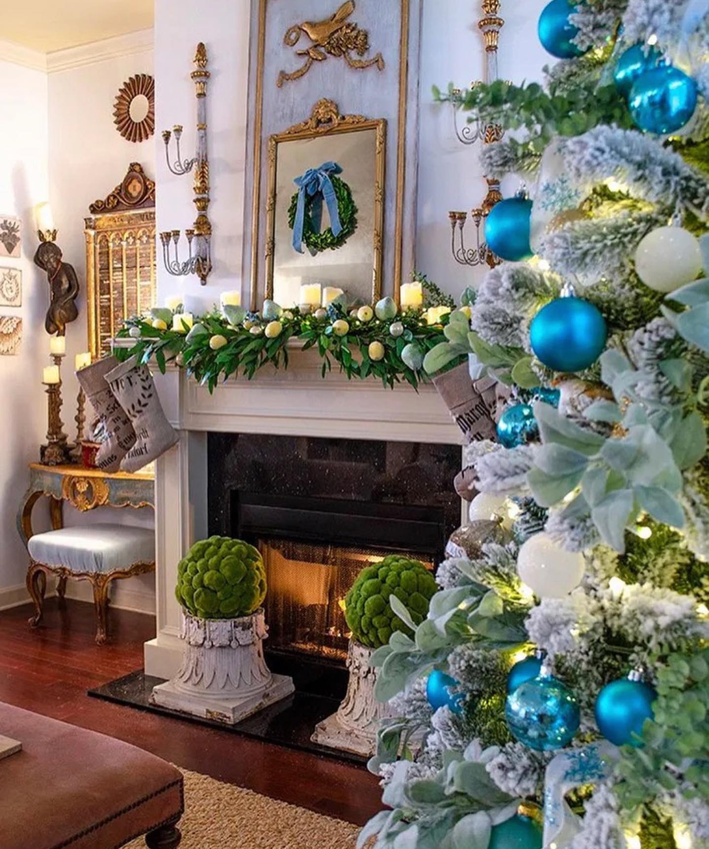 11. Sapphire Snowflakes and Ribbon Twirls: a Unique Blue Christmas Ornament Display