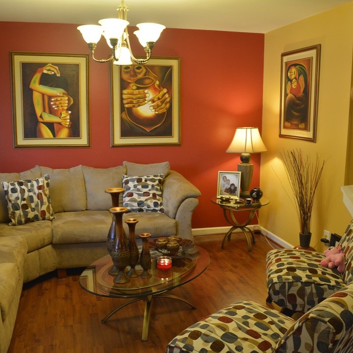 7. a Cozy Nook with a Sunlit Yellow Accent Wall and Vintage Green Armchair