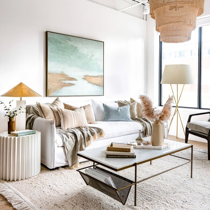 22. the Cobalt Blue Sofa with Geometric Wall Art Fusion