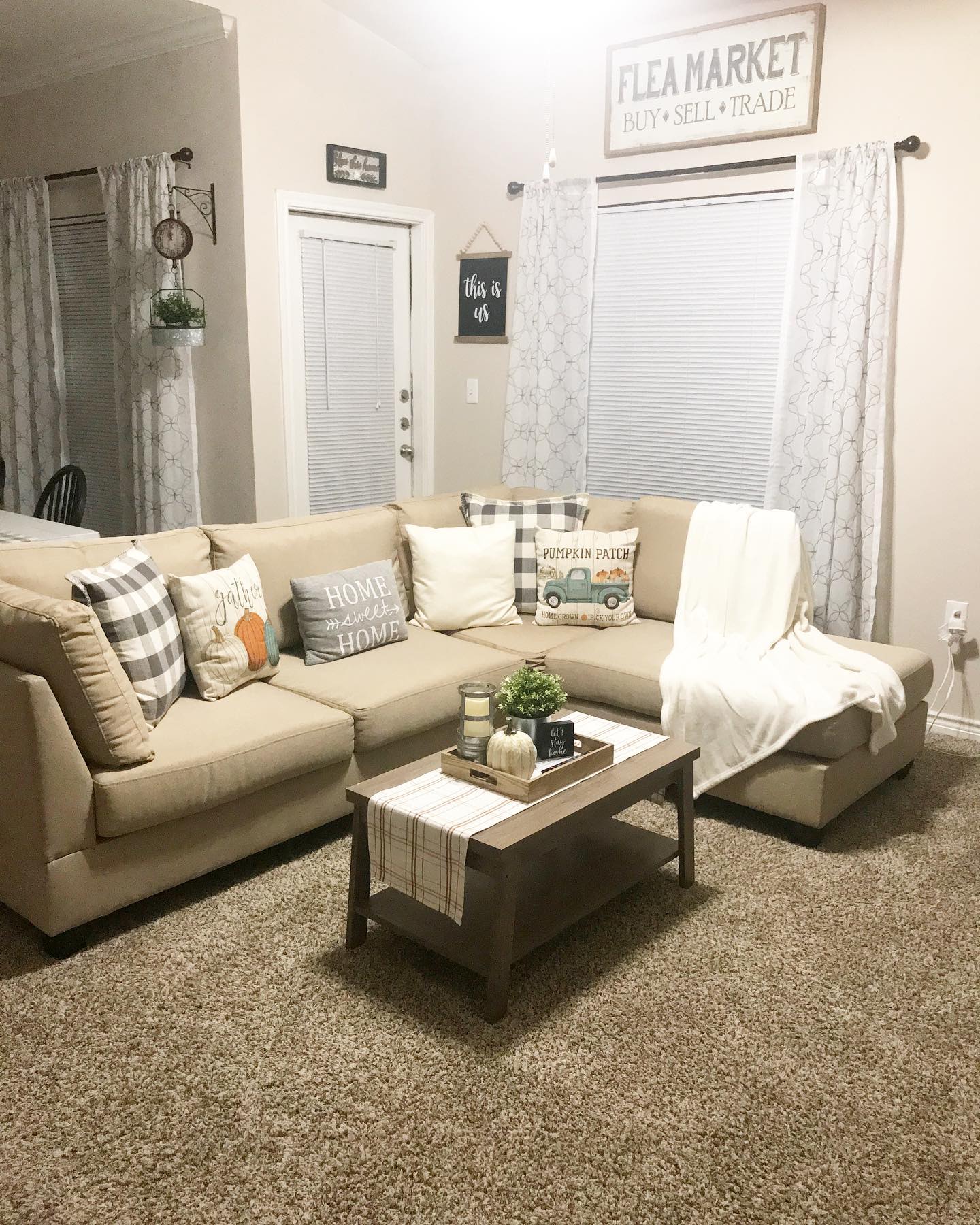 18. Vintage Typewriter on a Rustic Wooden Coffee Table with a Cozy Throw