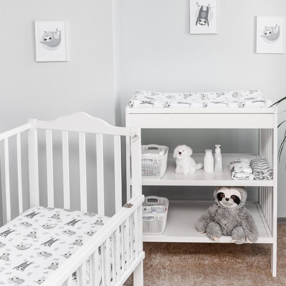 33. Vibrant Jungle Canopy with Giraffe Silhouette Over Crib