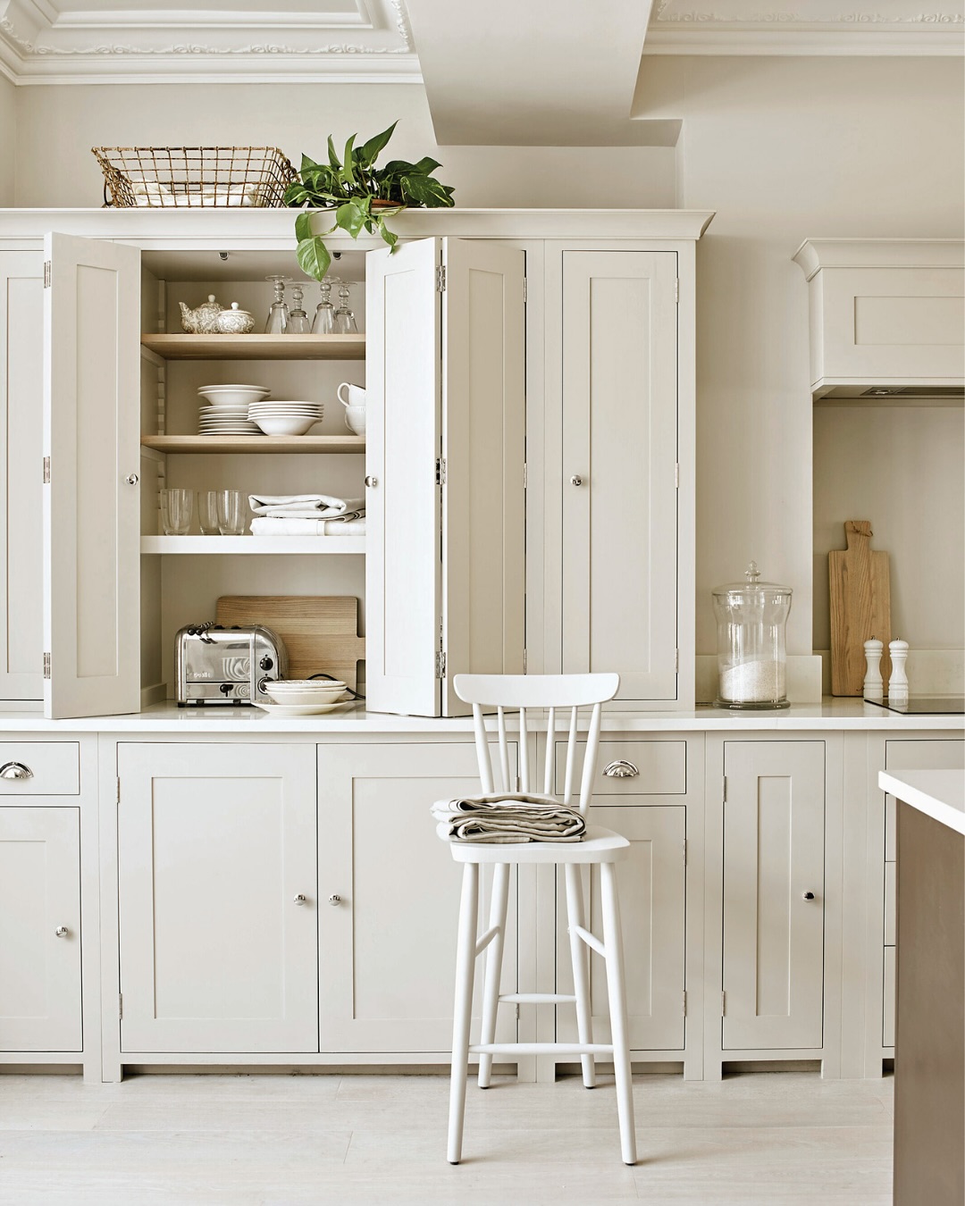 15. the Moonlit Shimmer Of Quartz Countertops Against Crisp White Shaker Cabinets
