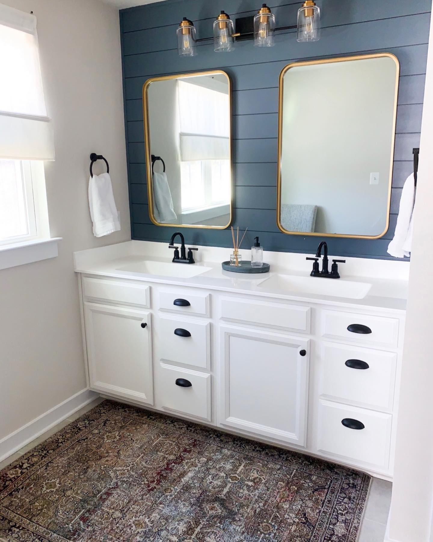 17. Shiplap Serenity with Vintage Brass and Botanical Accents