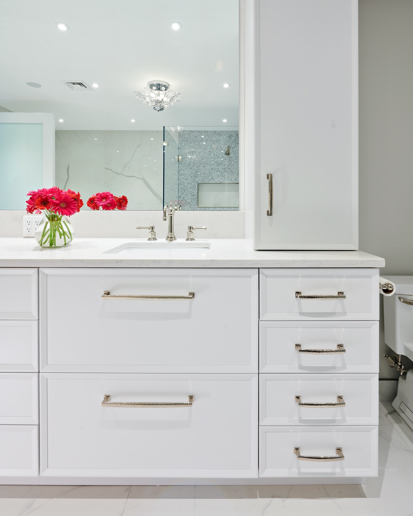 11. Moonlit Marble Waves: a Bathroom Vanity with Fluid Stone Curves and Glowing Accents