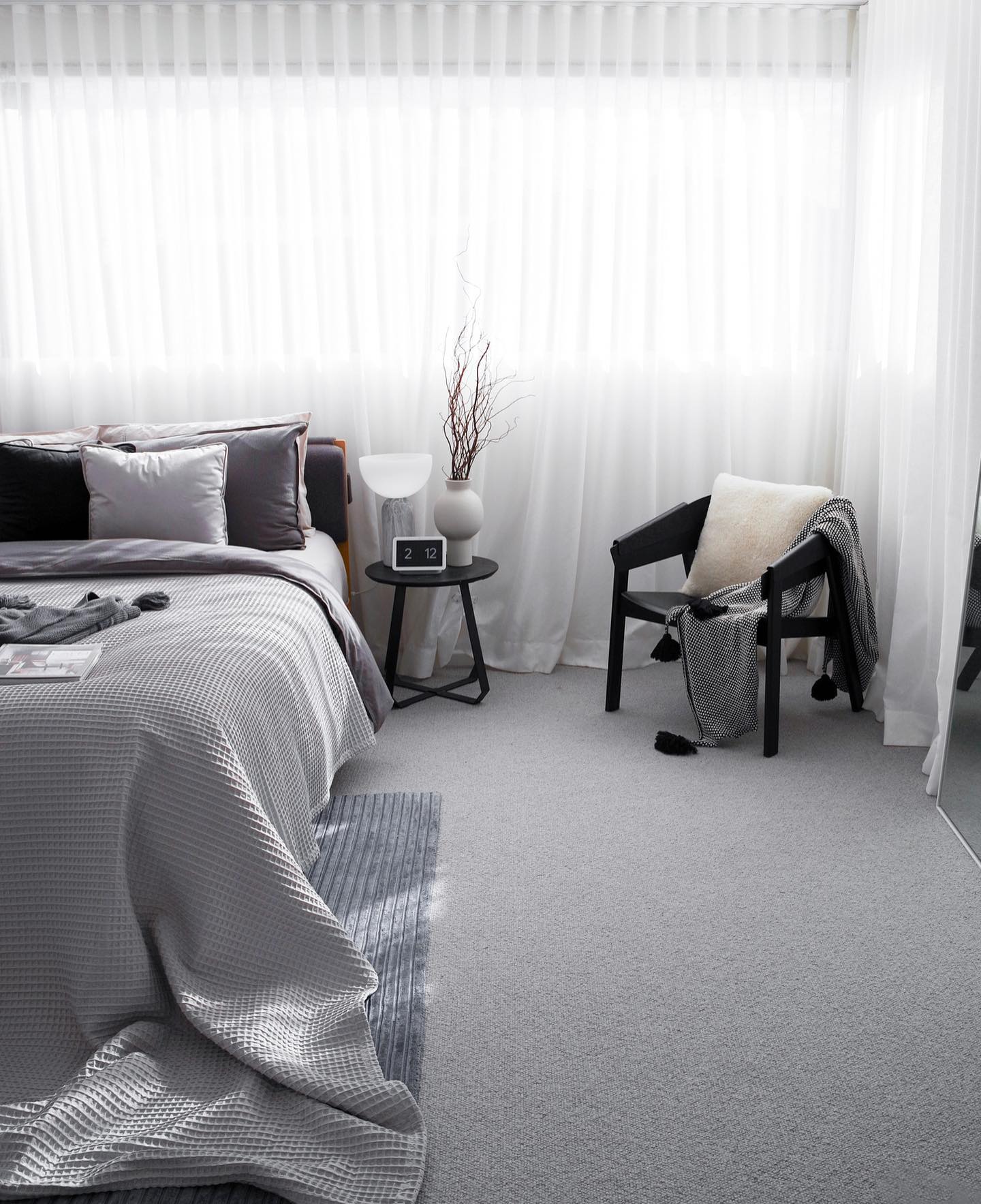 50. Moonlit Serenity: a Bedroom with Charcoal Walls and Silver Accents