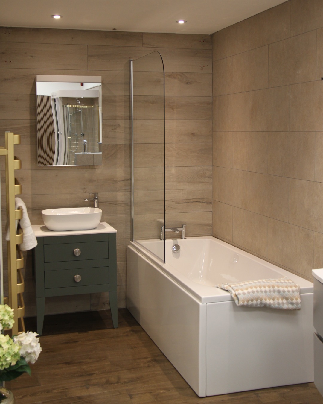 12. Molten Gold Accents Against Midnight Tiles In a Dreamy Spa Retreat