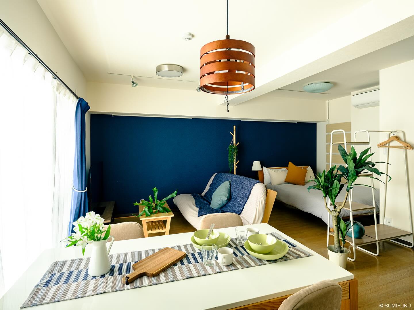 2. Compact Urban Oasis: a Murphy Bed and Fold-down Desk In a Neon-accented Studio