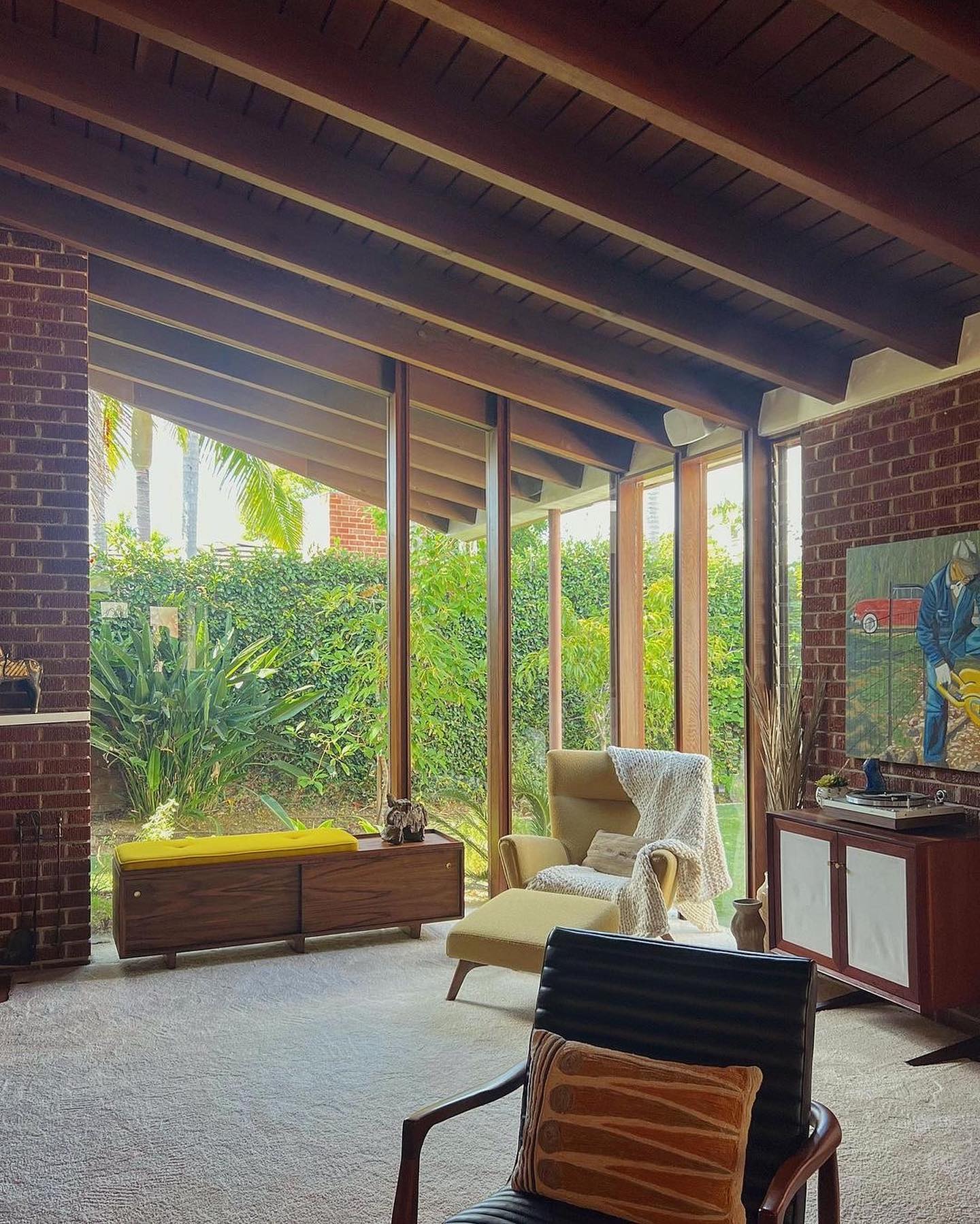 25. Southwestern Sunlit Porch with Terracotta Pots and Cactus Accents