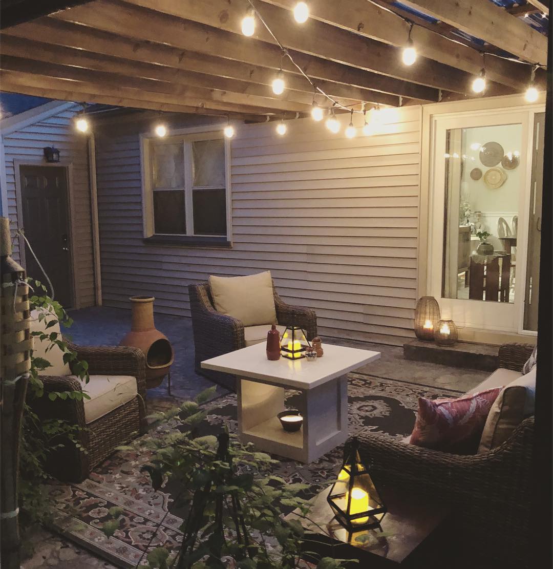 18. a Sunlit Lattice Pergola with Terracotta Pots and Woven Lanterns