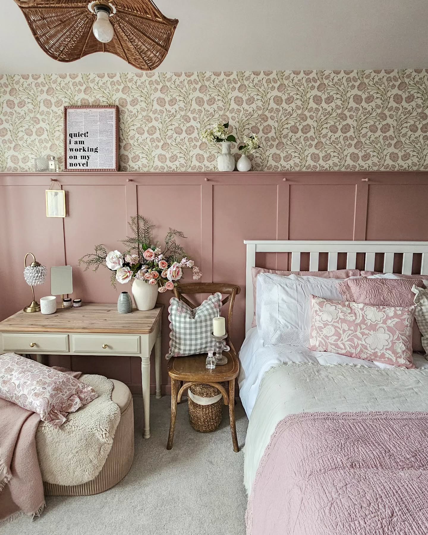 28. Pink Polka-dot Canopy Over a Vintage Bed with Floral Accents