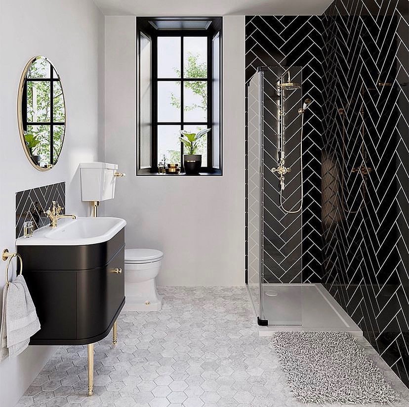 9. Black and White Mosaic Marvel with Geometric Wall Accents
