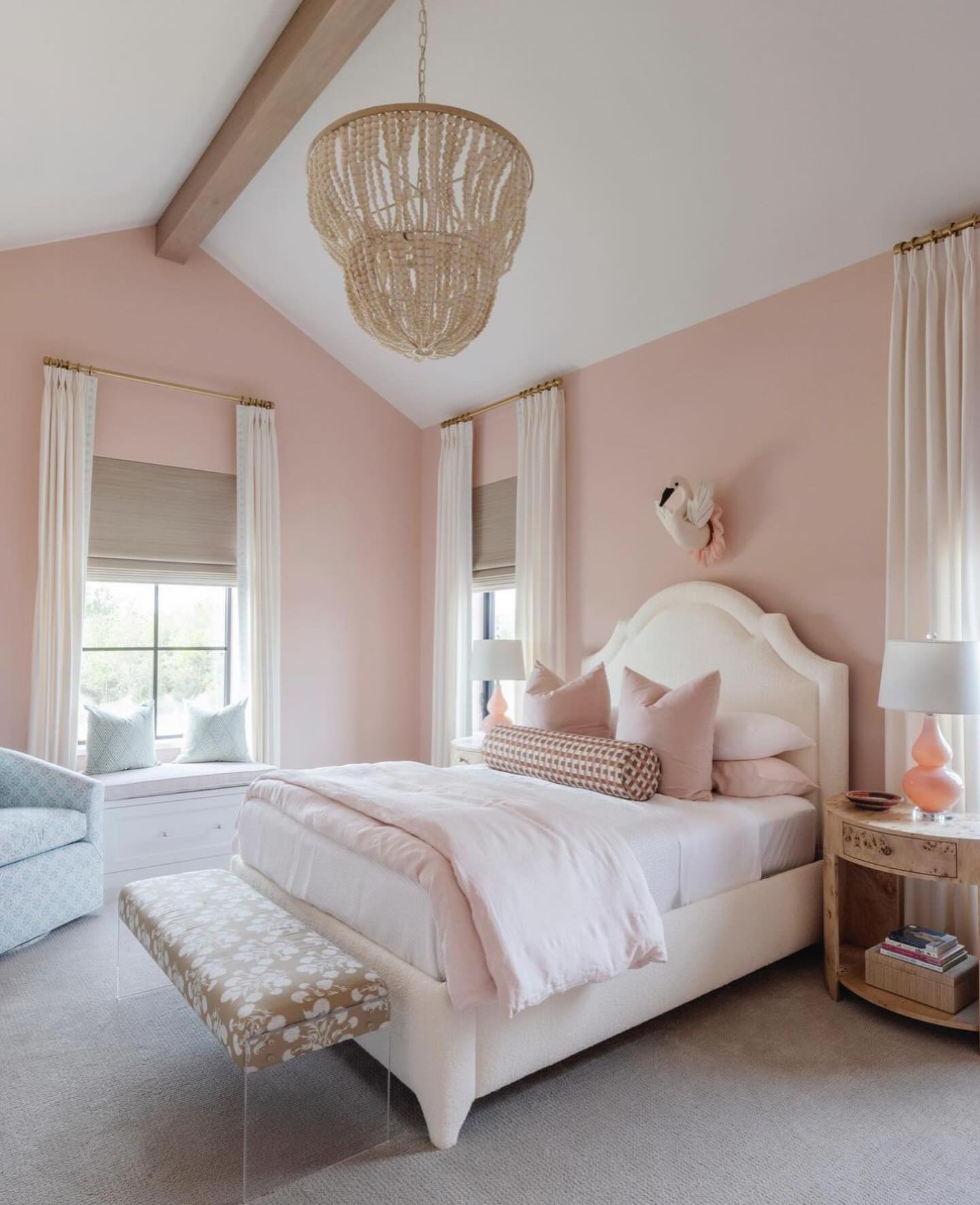 24. a Ballet Slipper Pink Canopy Bed with Lavender Accents and a Secret Reading Nook