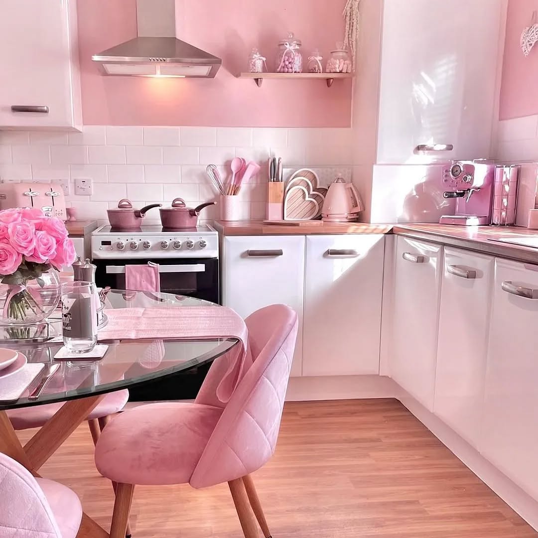 21. Bubblegum Pink Cabinets with Vintage Brass Hardware and Checkerboard Floor