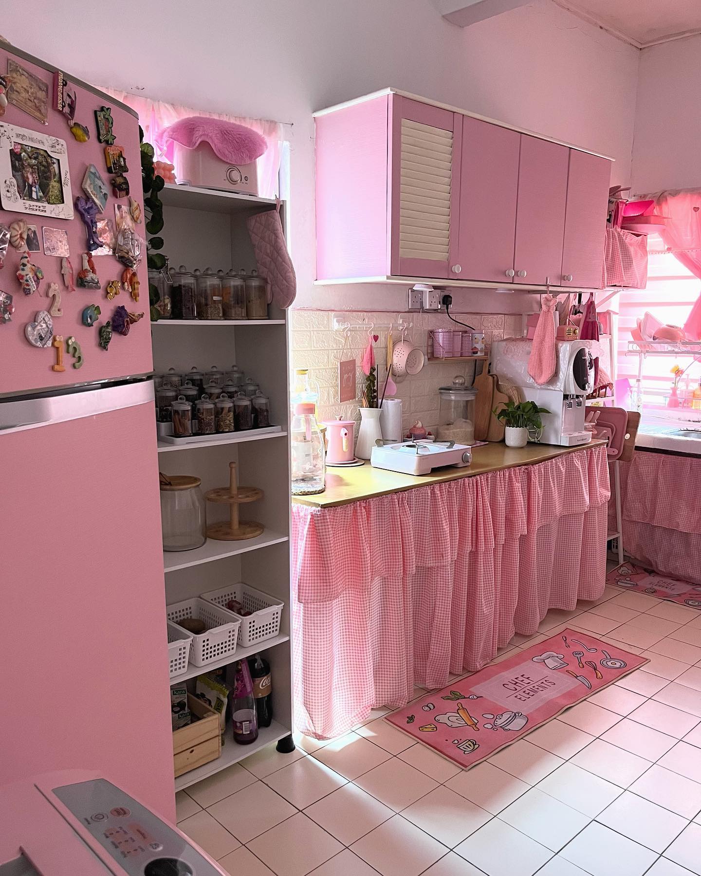 31. Raspberry Ripple Countertops and Rose Gold Accents: a Kitchen Where Vintage Meets Modern