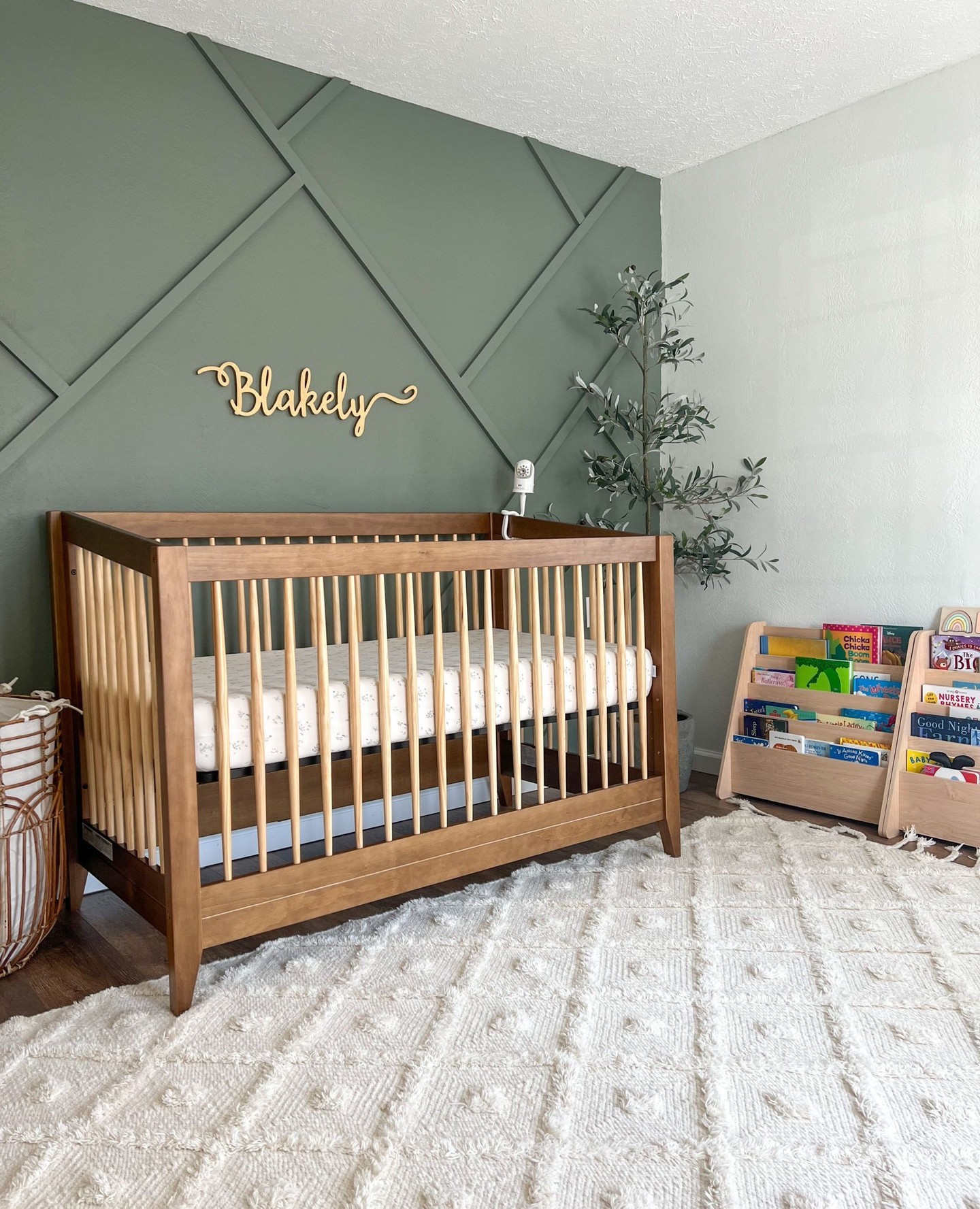 7. Moonlit Forest Canopy Crib Mobile and Geometric Wall Art In Gender-neutral Nursery